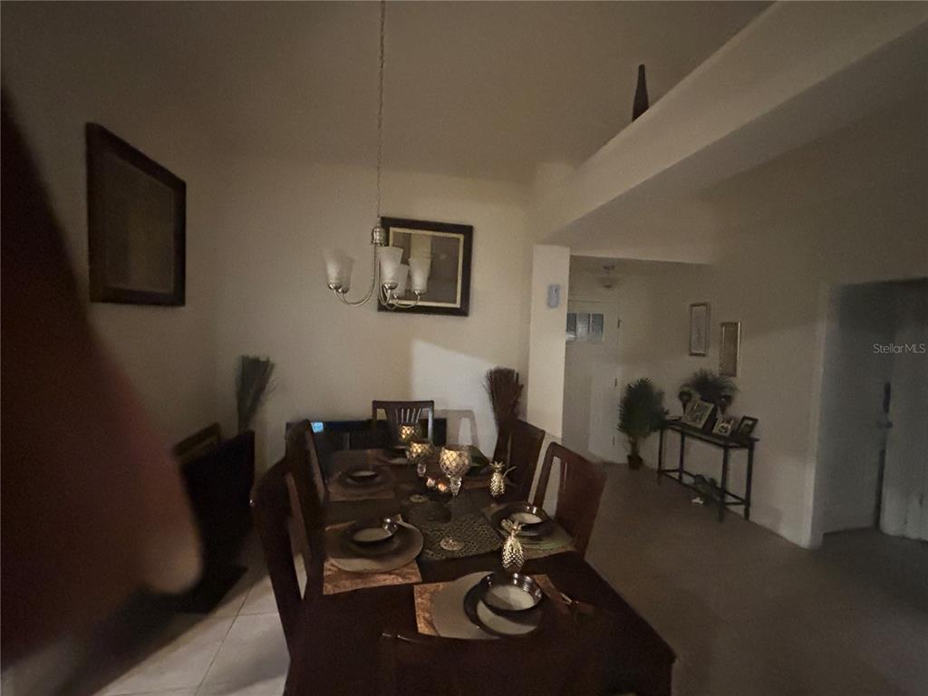 12214 Legacy Bright Street Riverview, FL 33578 - Photo 11 of 16 a view of a dining room with furniture