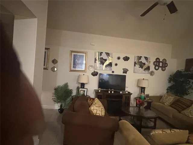 a living room with furniture and a couch