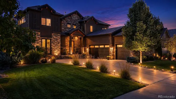 a view of a building with a yard