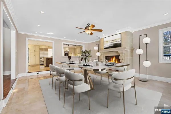 a living room with lots of furniture and a flat screen tv