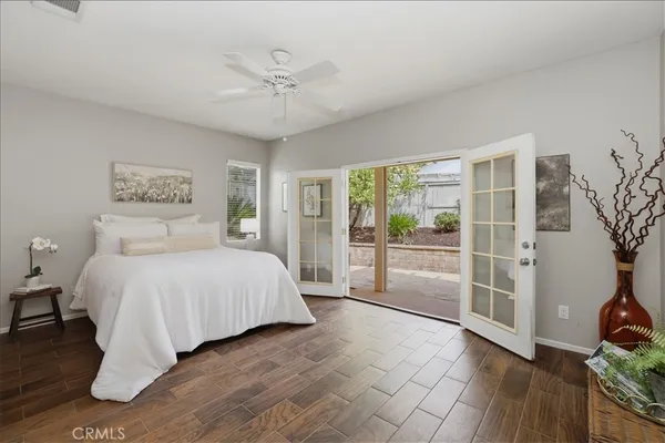 a bedroom with a large bed and a view of bedroom