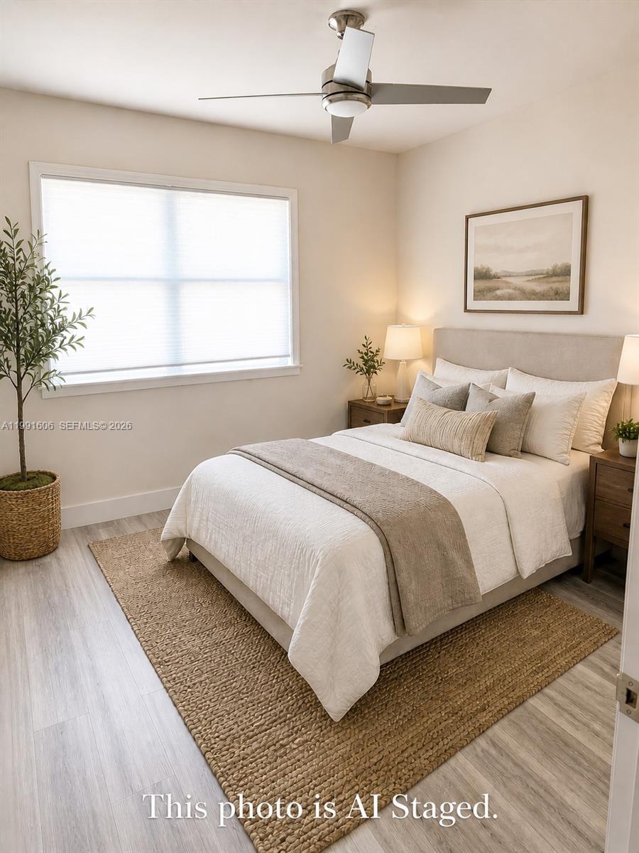 15615 Southwest 42nd Terrace Miami, FL 33185 - Photo 22 of 28 a bedroom with a bed and a window