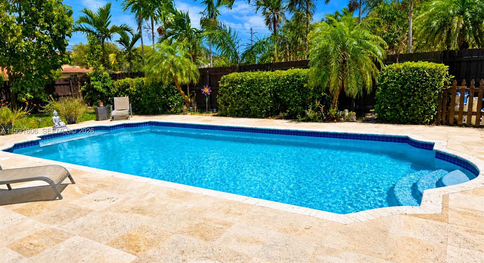15615 Southwest 42nd Terrace Miami, FL 33185 - Photo 4 of 28 a view of swimming pool with a yard