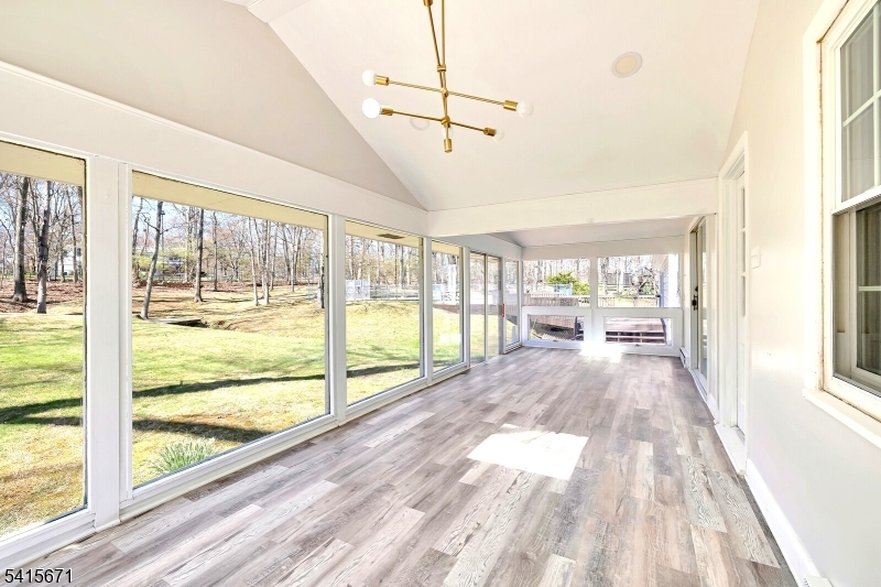 54 Robin Glen Road Watchung, NJ 07069 - Photo 34 of 42 a view of a room with wooden floor and windows