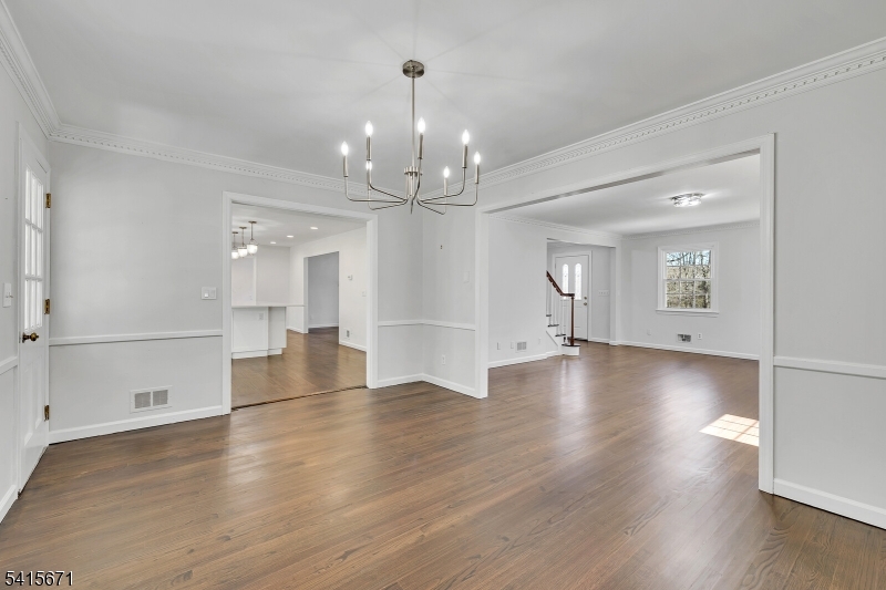 54 Robin Glen Road Watchung, NJ 07069 - Photo 10 of 42 wooden floor in an empty room with a window