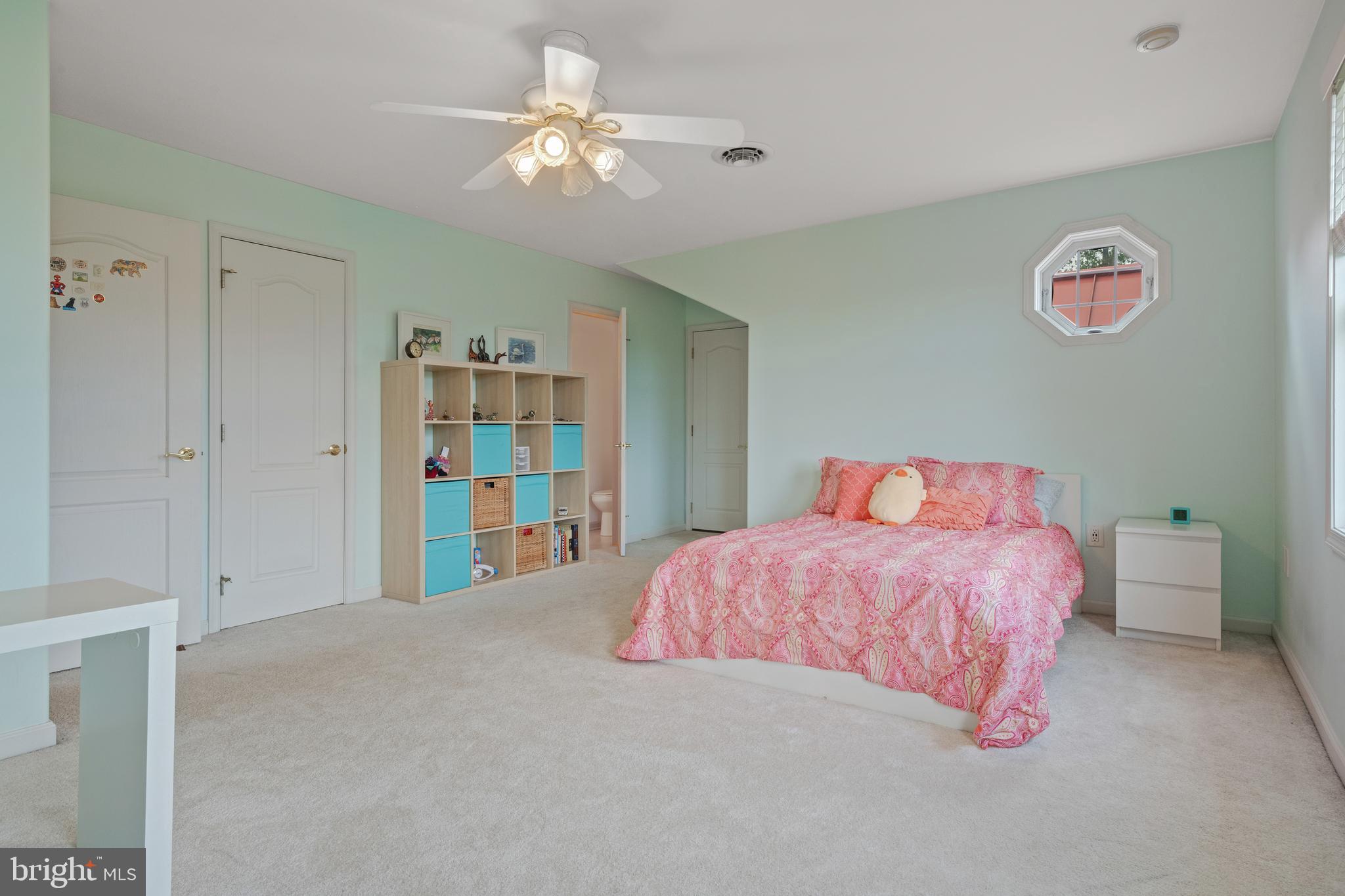 12451 High Point Road Felton, PA 17322 - Photo 44 of 71 a bedroom with a bed and a chandelier
