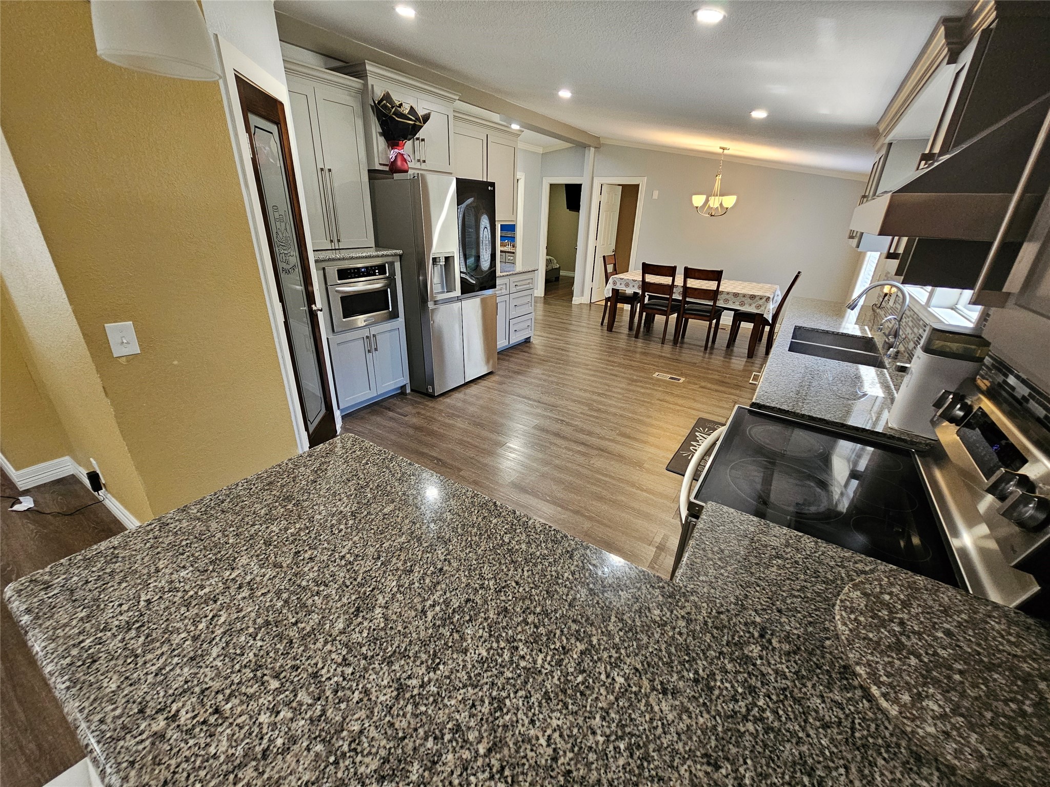 16313 Sandy View Drive Conroe, TX 77303 - Photo 20 of 41 a view of a living room and dining room