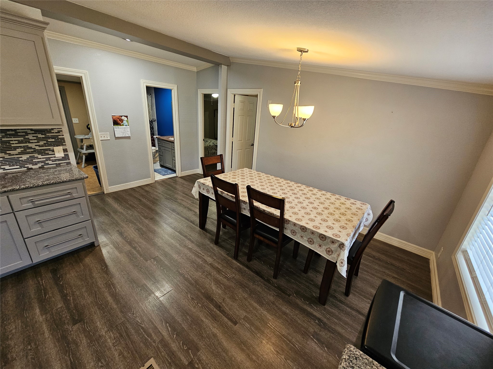 16313 Sandy View Drive Conroe, TX 77303 - Photo 23 of 41 a room with wooden floors and furniture