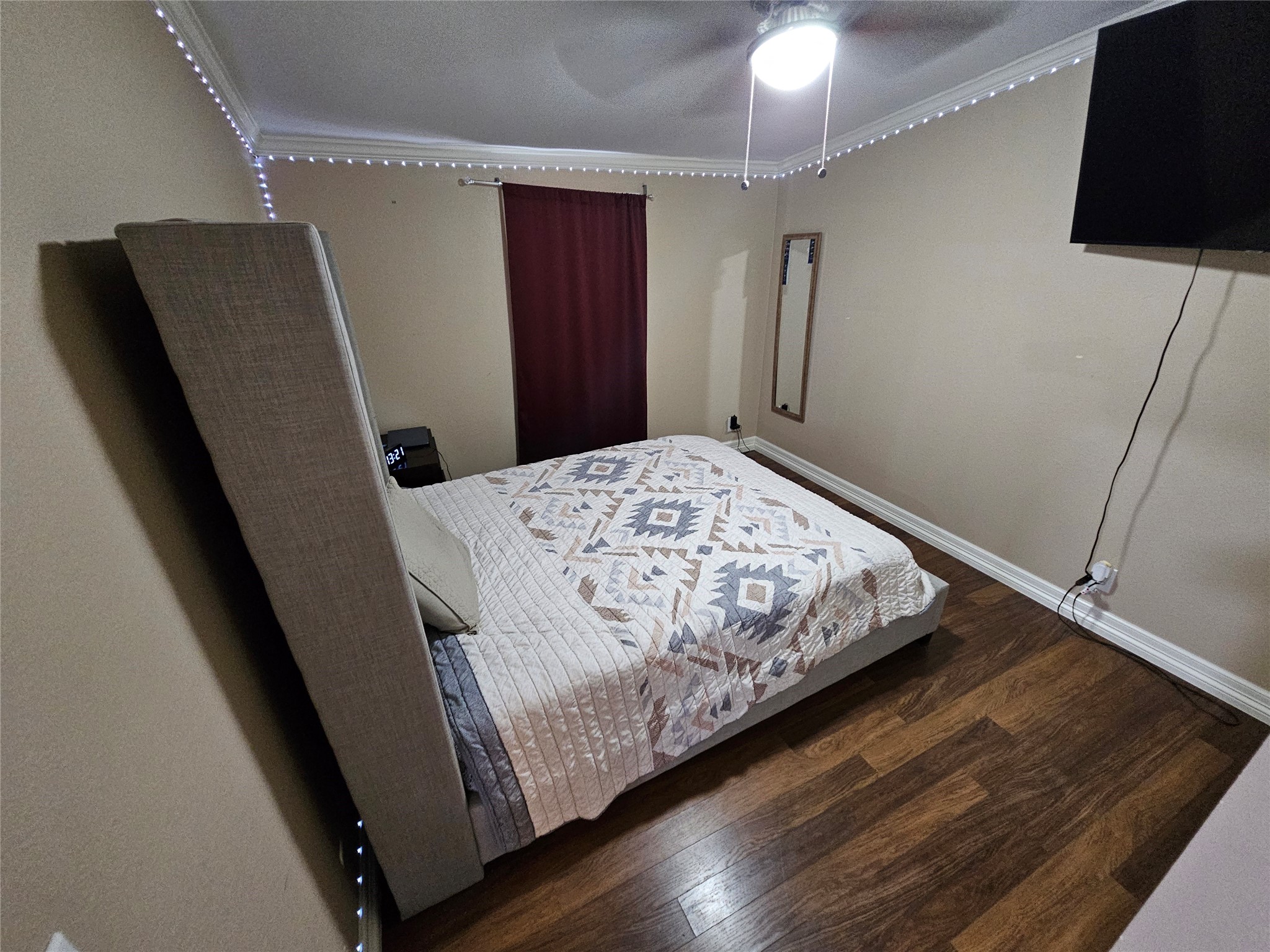 16313 Sandy View Drive Conroe, TX 77303 - Photo 27 of 41 a bed sitting in a bedroom and mirror