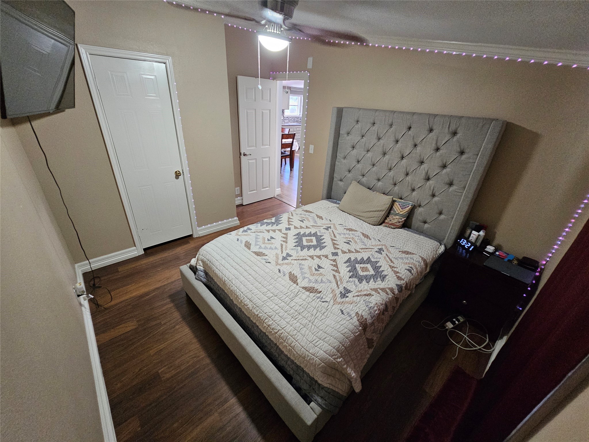 16313 Sandy View Drive Conroe, TX 77303 - Photo 28 of 41 a bed sitting in a bedroom next to a window with kitchen