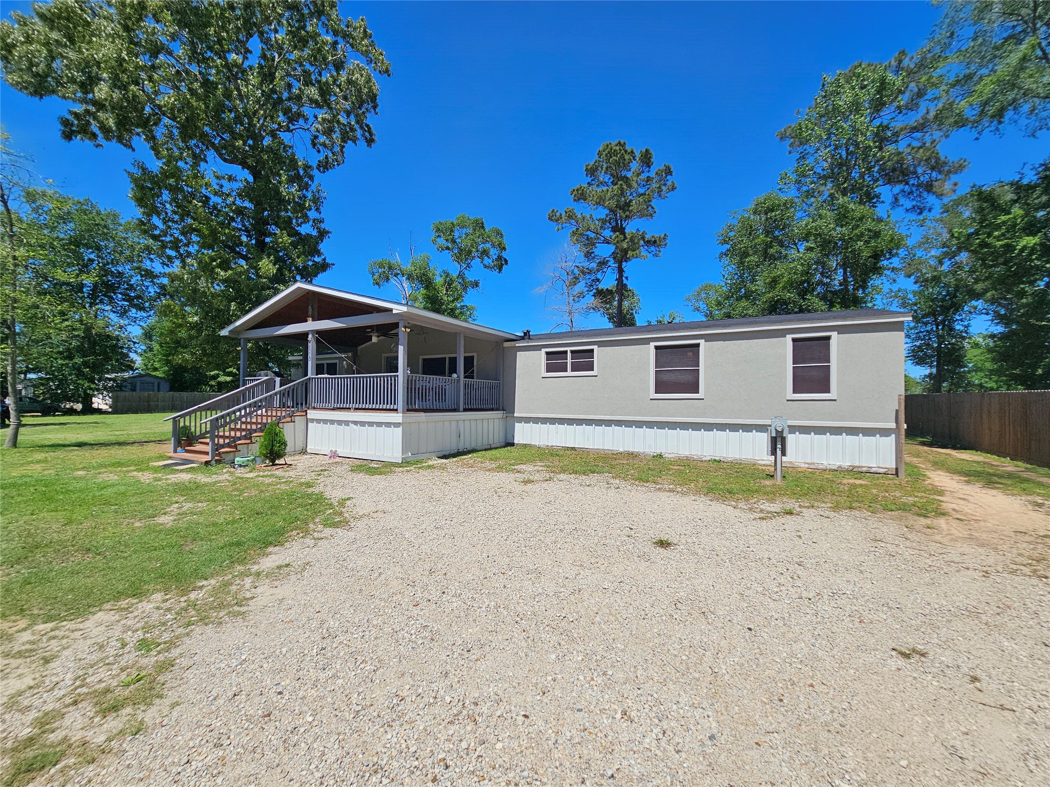 16313 Sandy View Drive Conroe, TX 77303 - Photo 33 of 41 a house view with a garden space