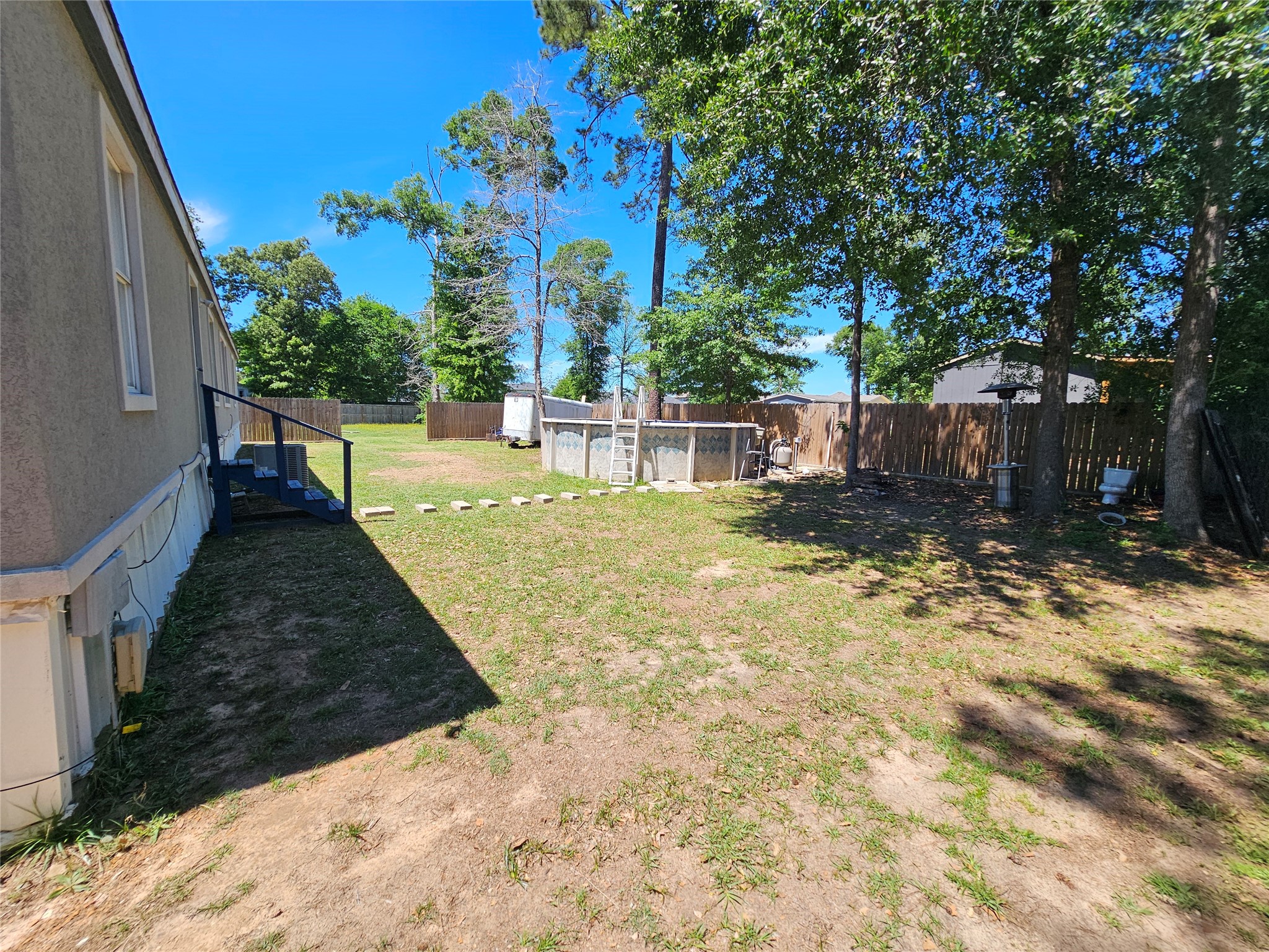 16313 Sandy View Drive Conroe, TX 77303 - Photo 34 of 41 a view of a backyard with swimming pool