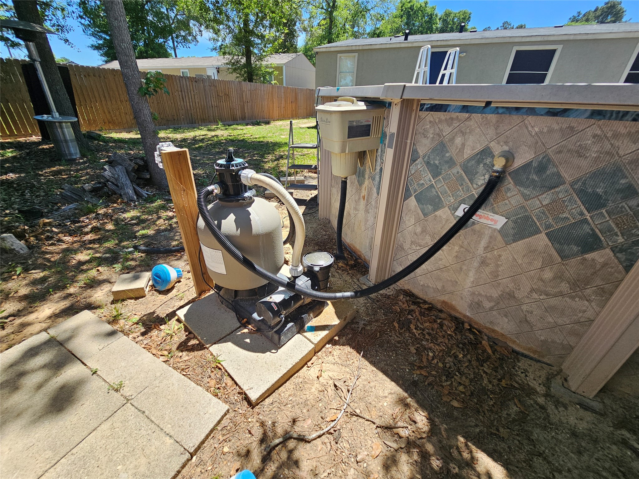 16313 Sandy View Drive Conroe, TX 77303 - Photo 37 of 41 a view of a backyard with wooden floor