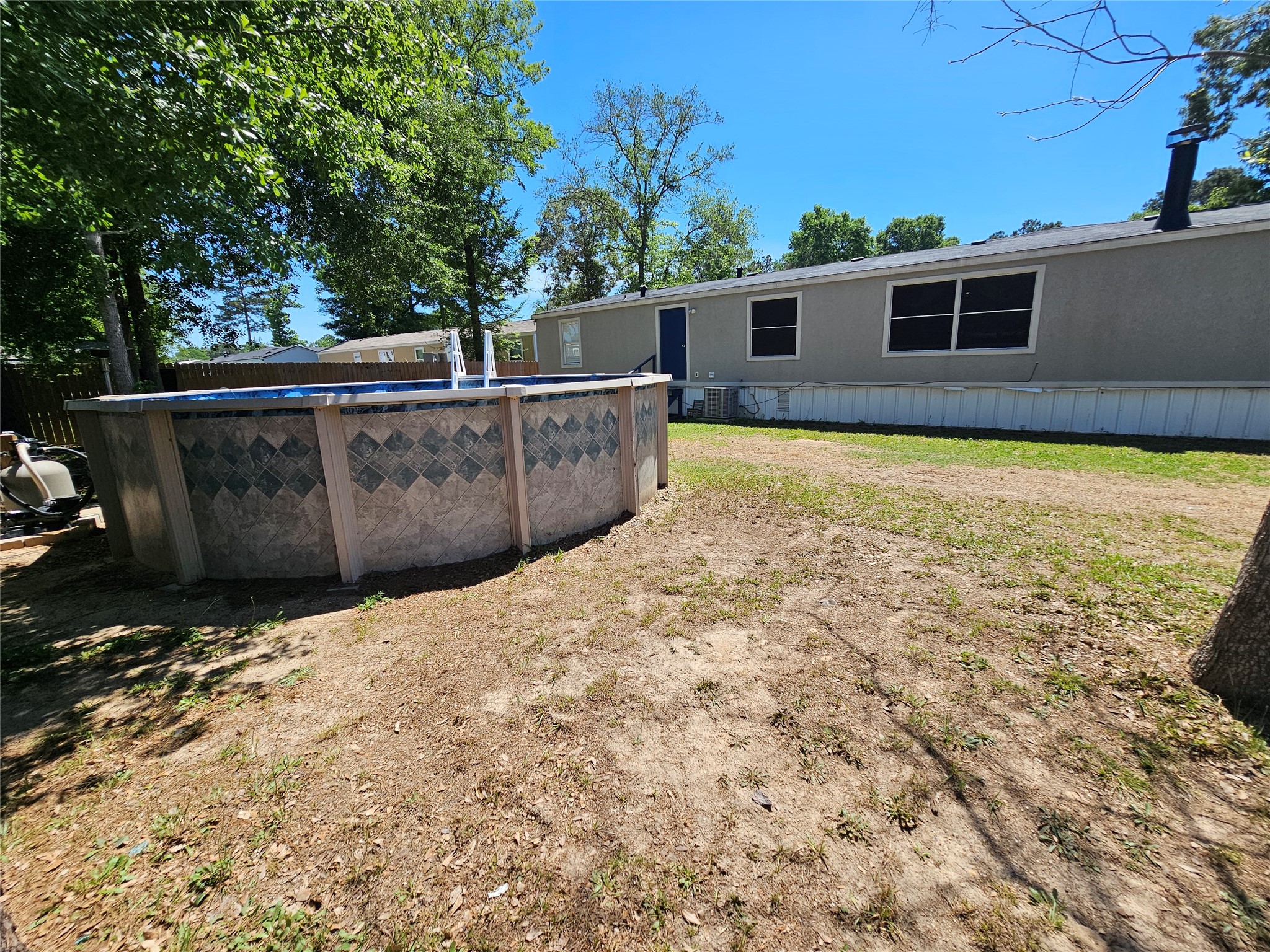 16313 Sandy View Drive Conroe, TX 77303 - Photo 39 of 41 a view of a backyard