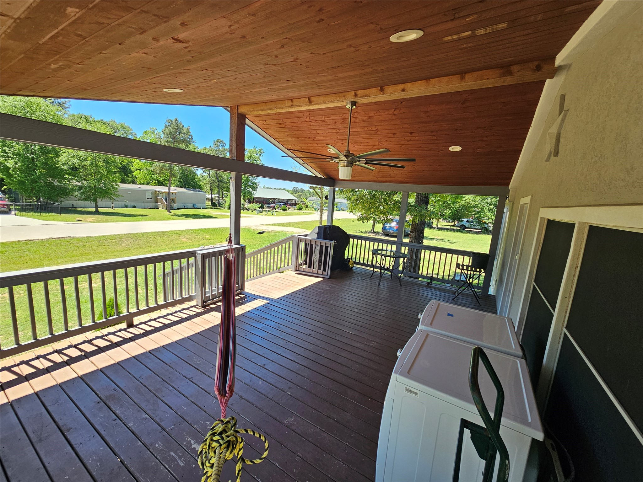 16313 Sandy View Drive Conroe, TX 77303 - Photo 5 of 41 a view of a patio with wooden floor