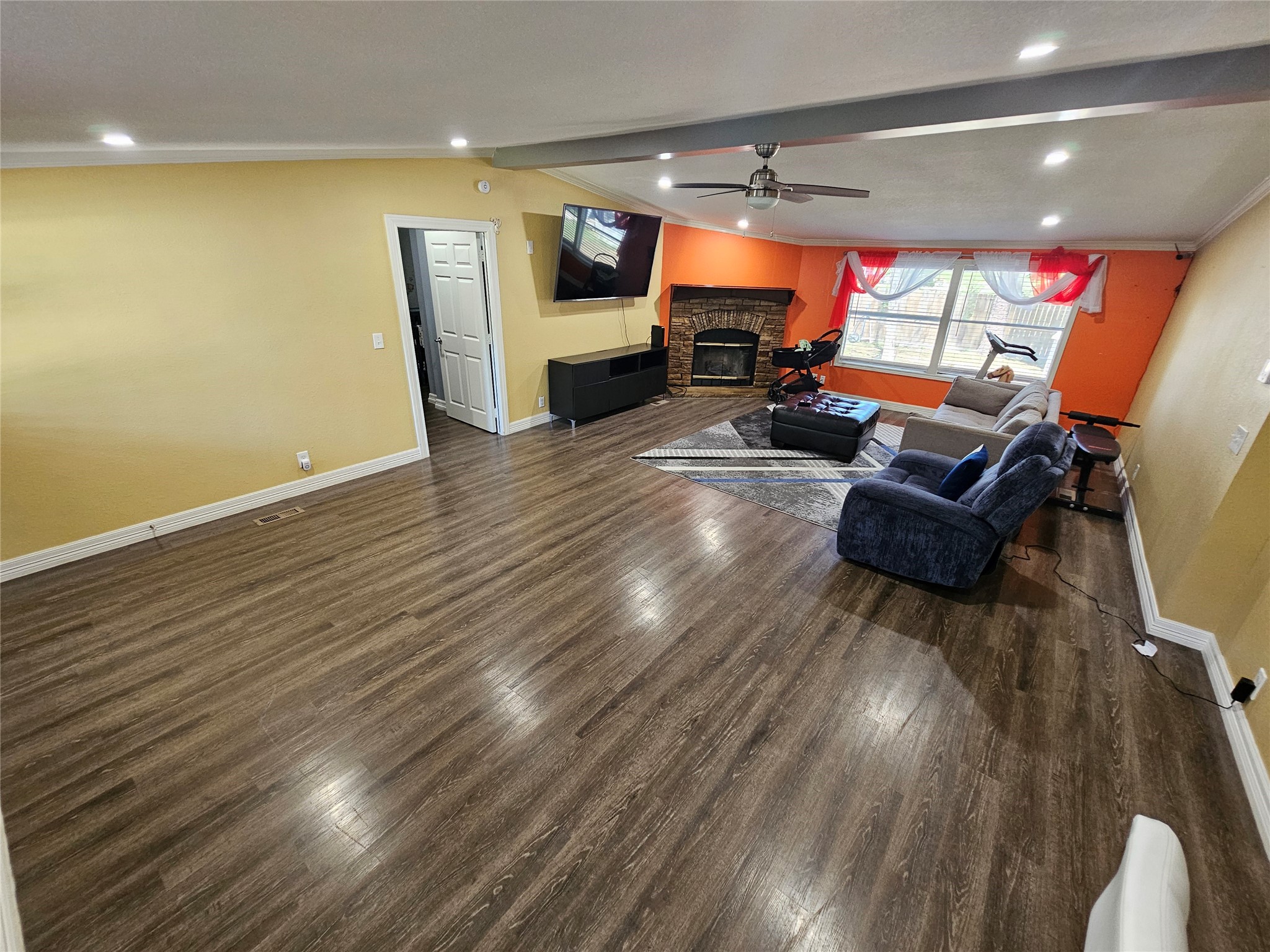16313 Sandy View Drive Conroe, TX 77303 - Photo 8 of 41 a living room with furniture and a flat screen tv