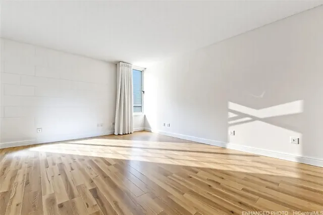 a view of a livingroom with wooden floor