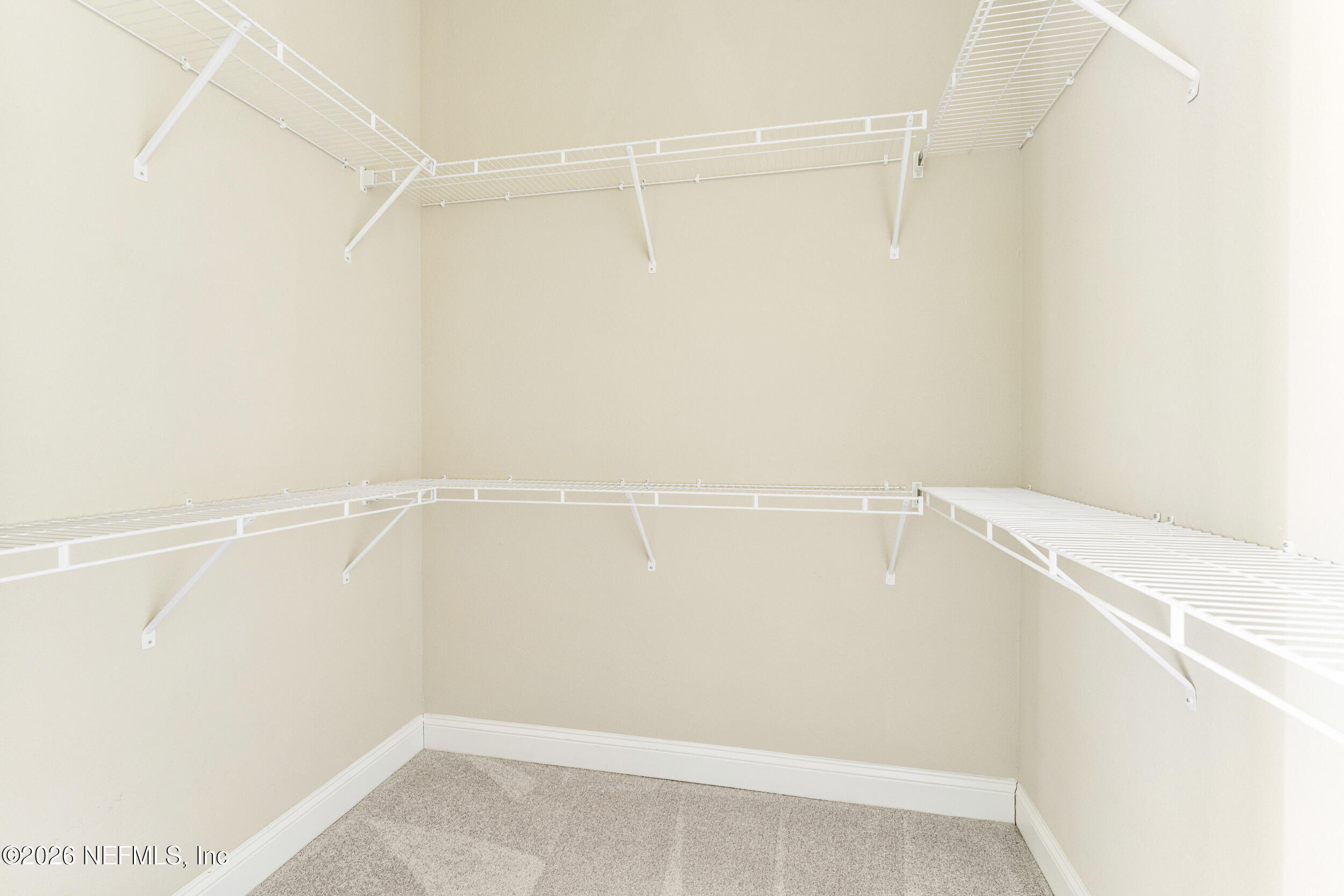 151 Calliel Way St. Johns, FL 32259 - Photo 16 of 35 a view of a room with racks on the wall