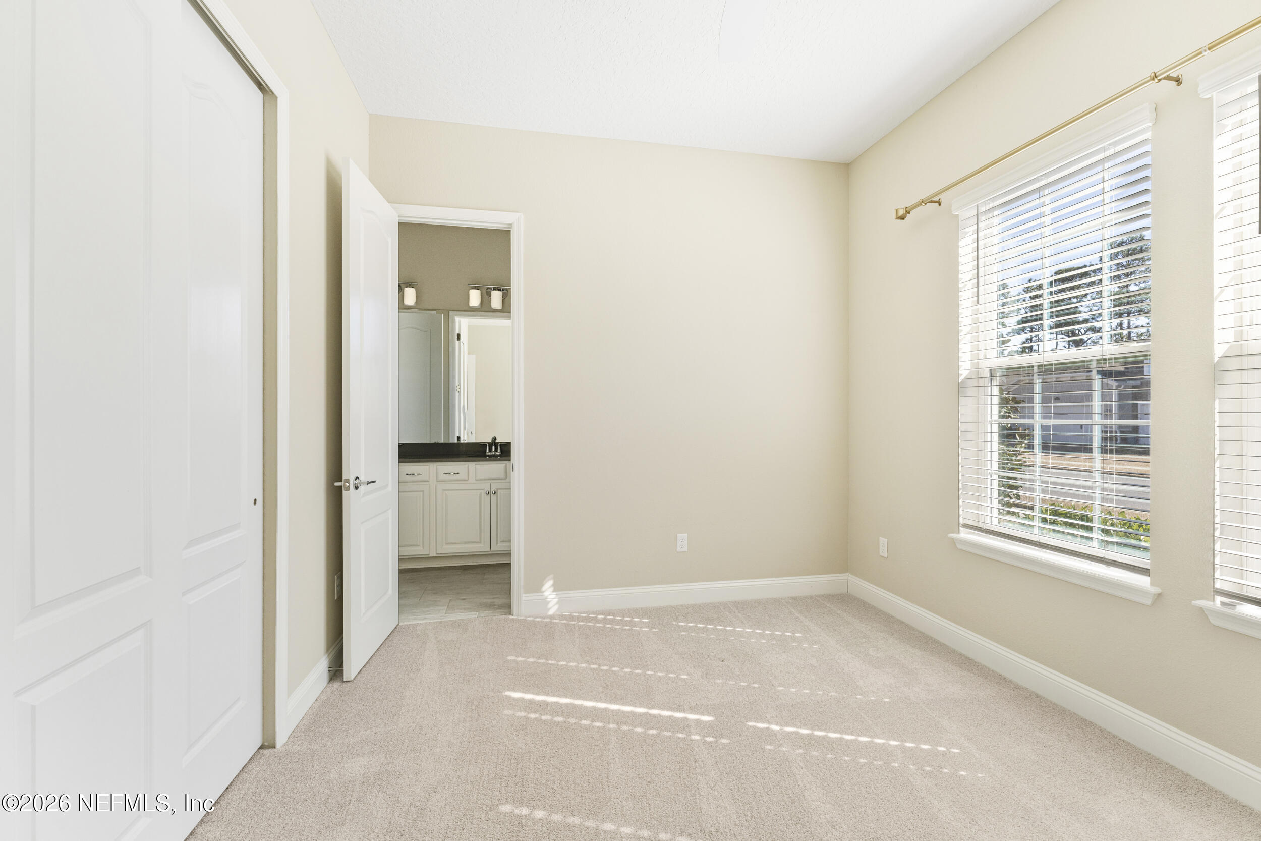 151 Calliel Way St. Johns, FL 32259 - Photo 19 of 35 a view of an empty room with a window