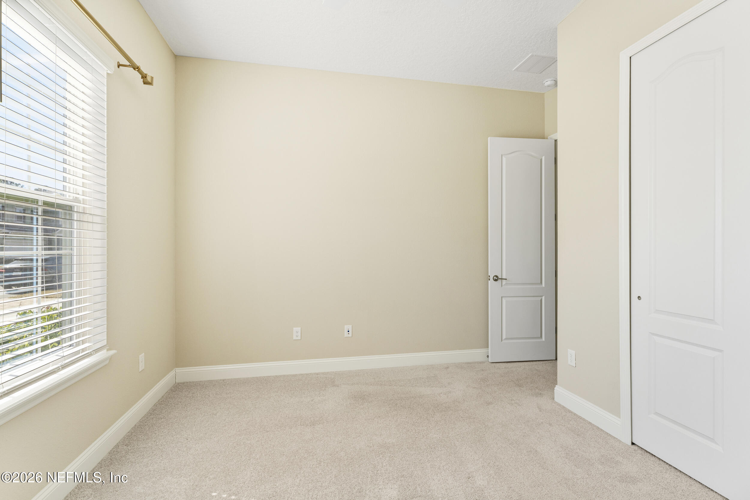 151 Calliel Way St. Johns, FL 32259 - Photo 20 of 35 a view of an empty room with a window