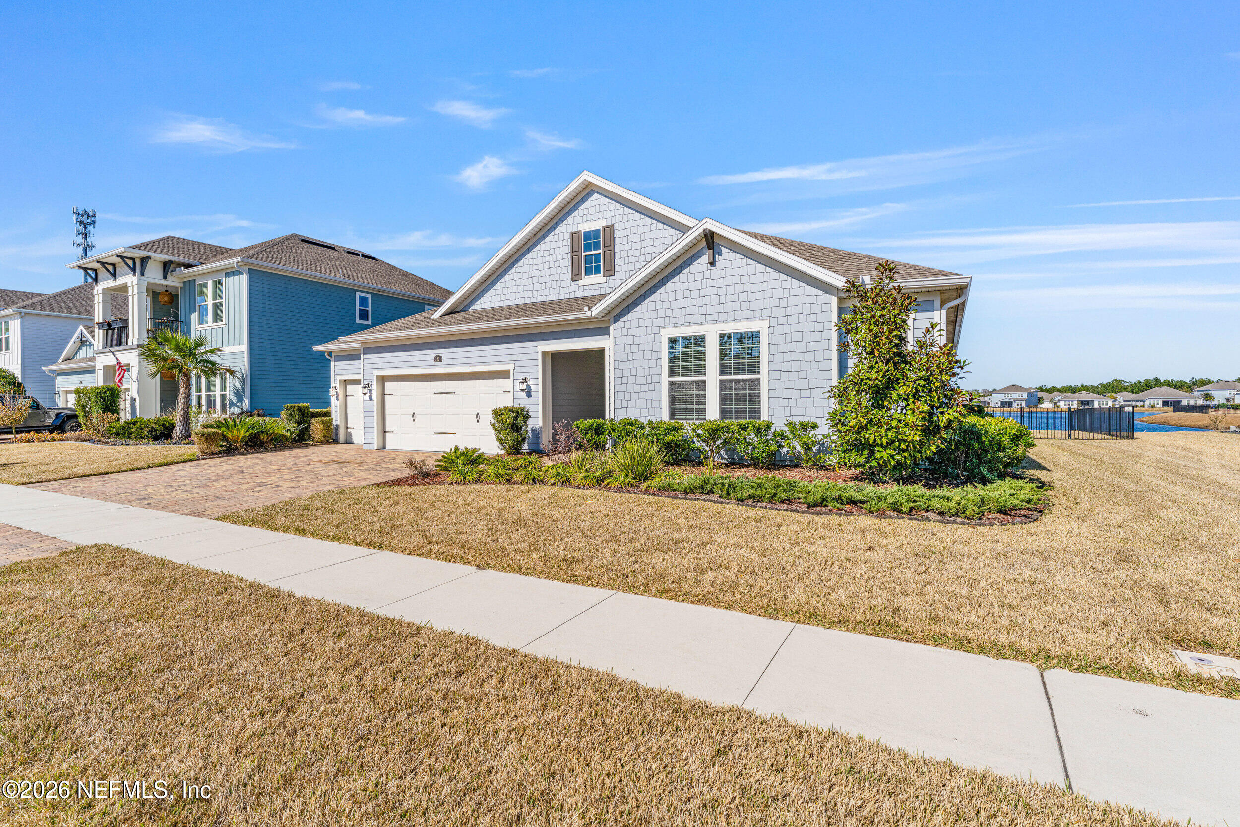 151 Calliel Way St. Johns, FL 32259 - Photo 2 of 35 a front view of a house with a yard and garage
