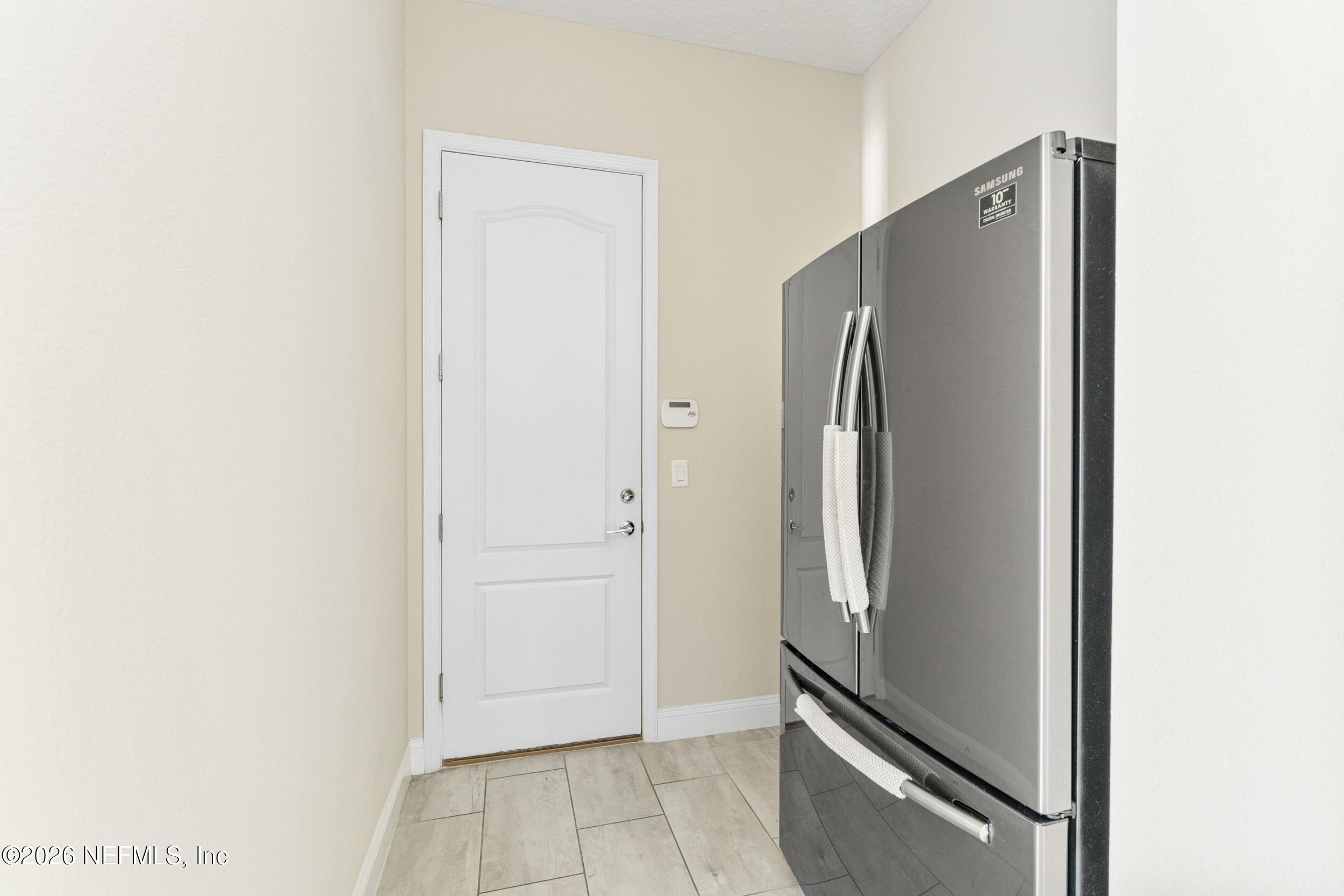 151 Calliel Way St. Johns, FL 32259 - Photo 29 of 35 a view of a refrigerator in kitchen and a refrigerator