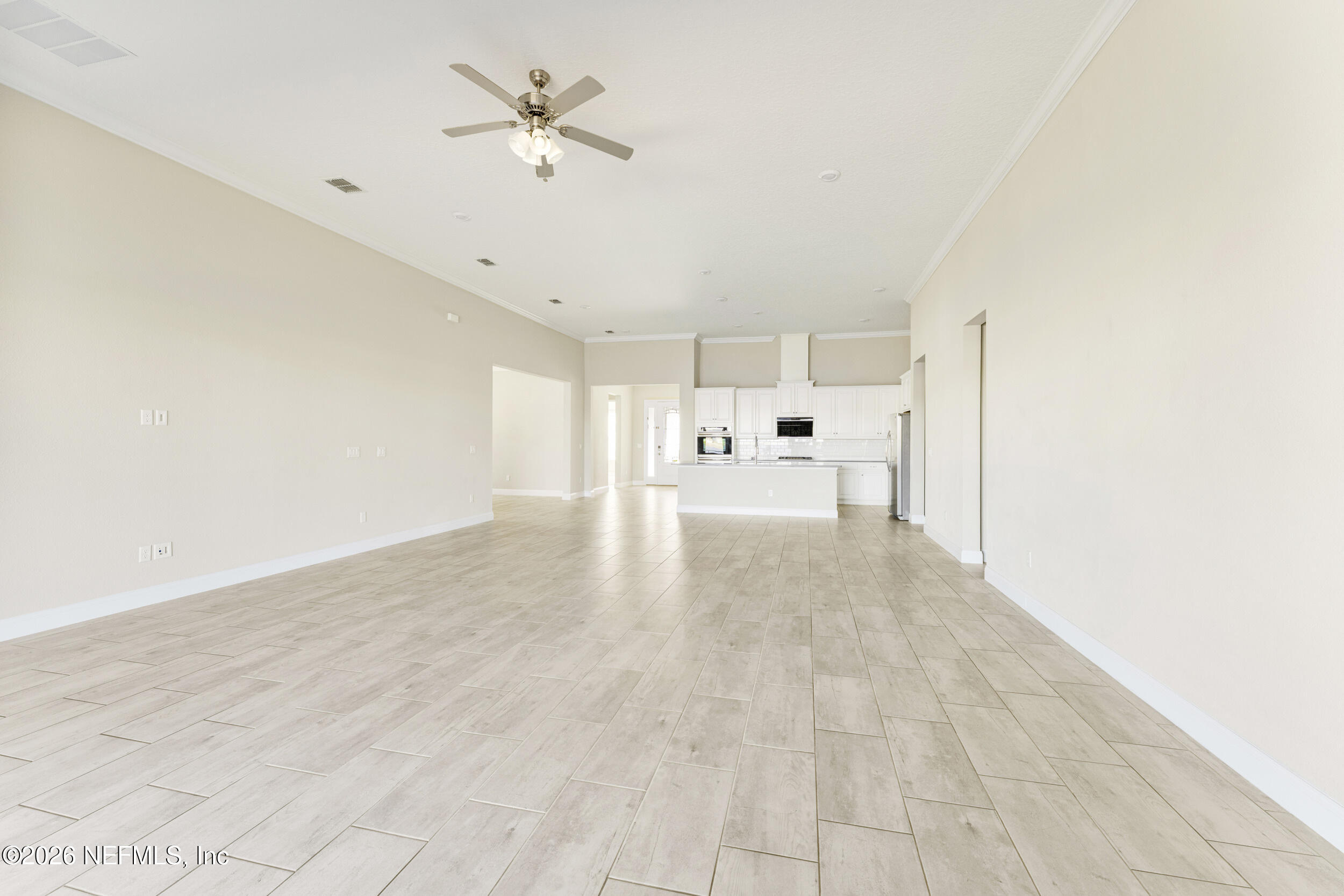 151 Calliel Way St. Johns, FL 32259 - Photo 10 of 35 a view of empty room with a fireplace