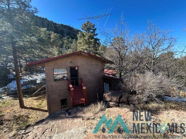 375 Hop Canyon Road Magdalena, NM 87825 - Photo 27 of 33 View of side of home