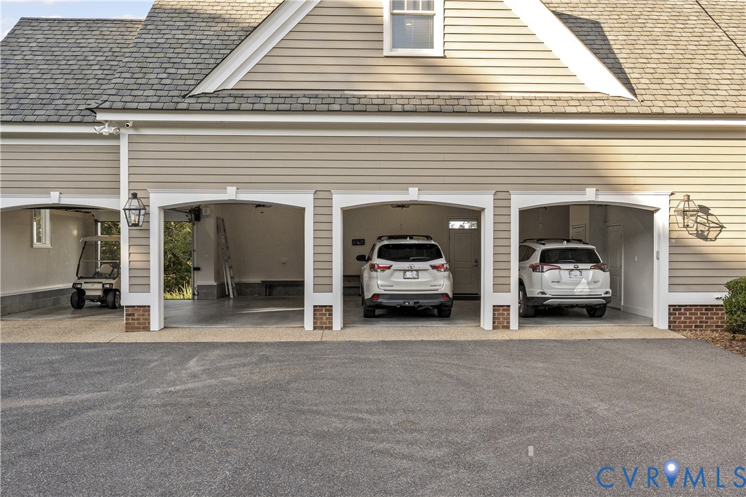 2515 Fleet's Bay Road White Stone, VA 22578 - Photo 47 of 74 a couple of cars parked in front of a house