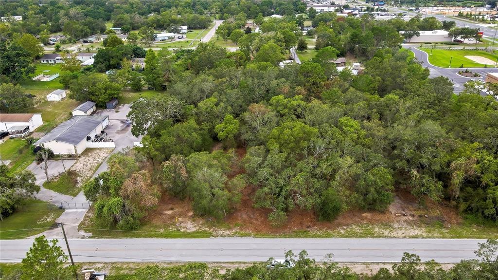 0 Old Shady Hills Road Spring Hill, FL 34610 - Photo 3 of 17 an aerial view of a residential houses with yard