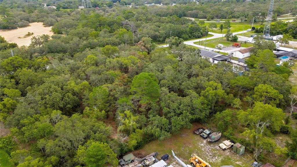 0 Old Shady Hills Road Spring Hill, FL 34610 - Photo 7 of 17 a view of a lake with a houses
