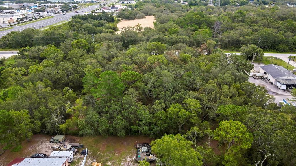 0 Old Shady Hills Road Spring Hill, FL 34610 - Photo 8 of 17 an aerial view of a house with a yard