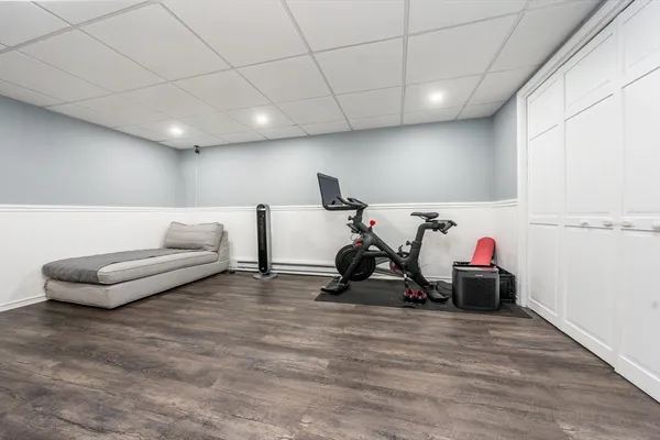 a stove top oven sitting inside of a kitchen