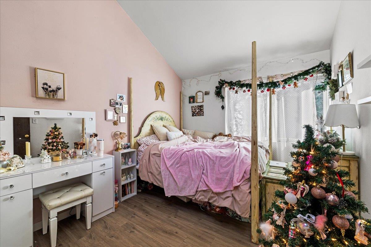 552 Walnut Street San Carlos, CA 94070 - Photo 17 of 27 a bedroom with bed and a mirror