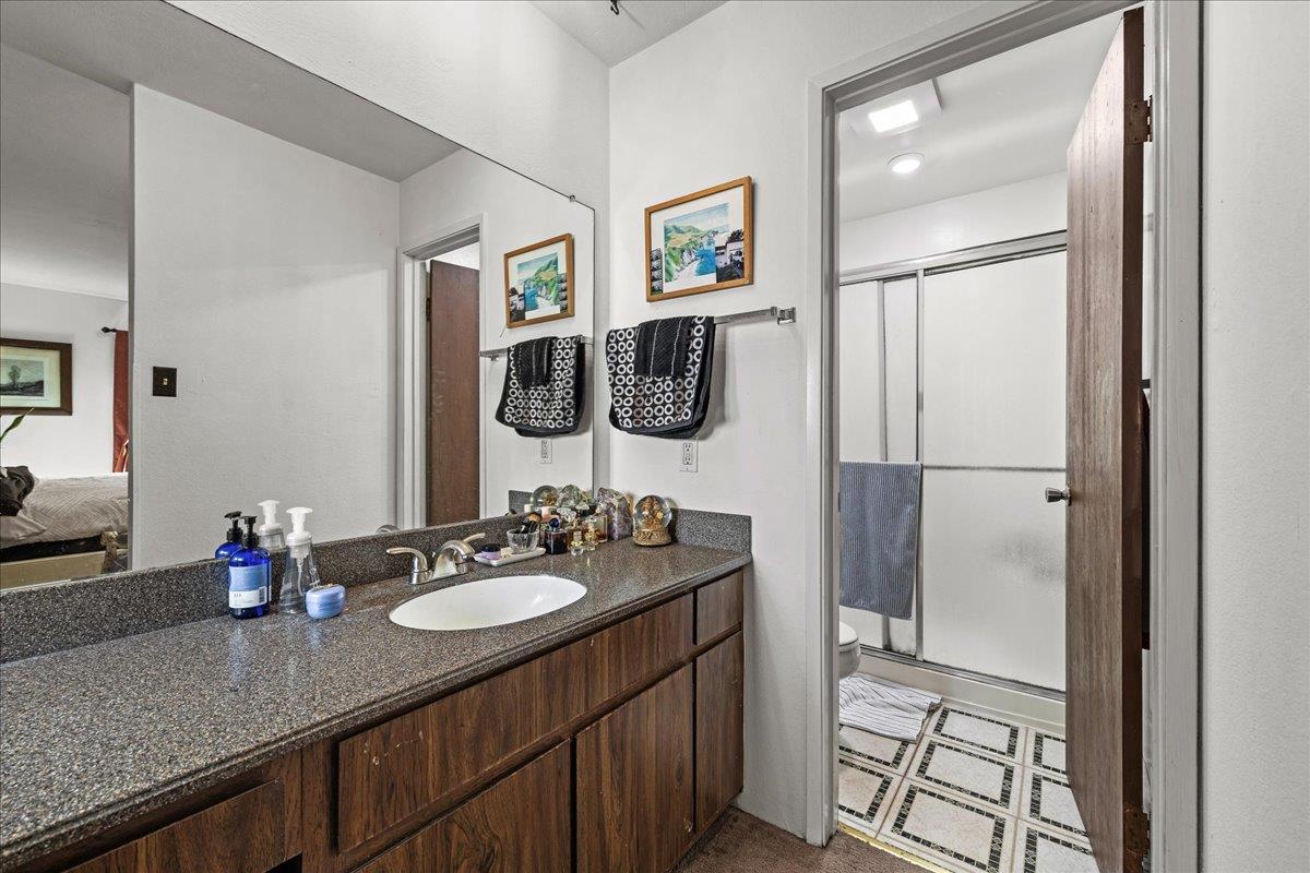 552 Walnut Street San Carlos, CA 94070 - Photo 24 of 27 a bathroom with a sink double vanity and a mirror