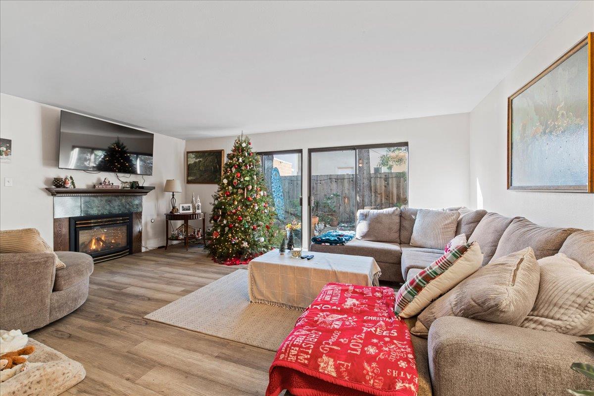 552 Walnut Street San Carlos, CA 94070 - Photo 7 of 27 a living room with furniture large window and a fireplace