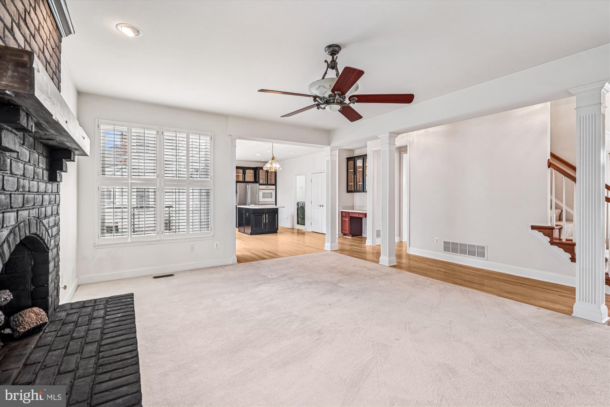 206 Heatherbloom Trail Gambrills, MD 21054 - Photo 18 of 46 a view of empty room with fireplace and windows