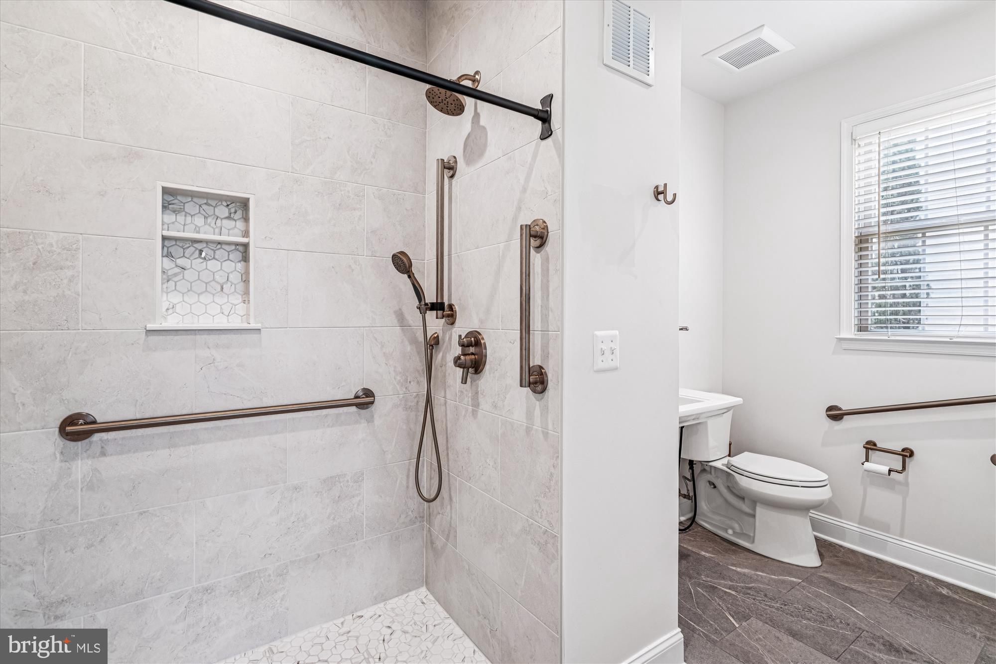 206 Heatherbloom Trail Gambrills, MD 21054 - Photo 20 of 46 a bathroom with a shower a toilet and a shower