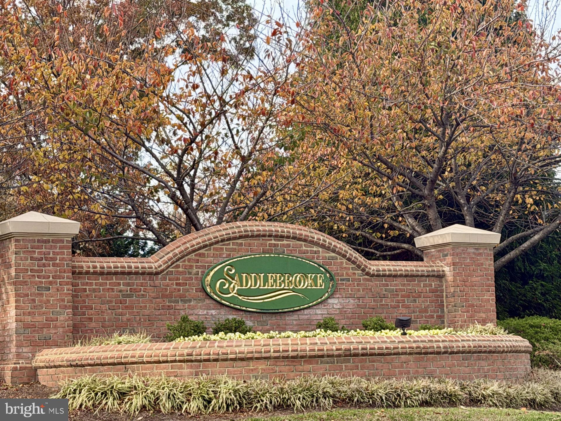 206 Heatherbloom Trail Gambrills, MD 21054 - Photo 2 of 46 a sign that is on the side of a building