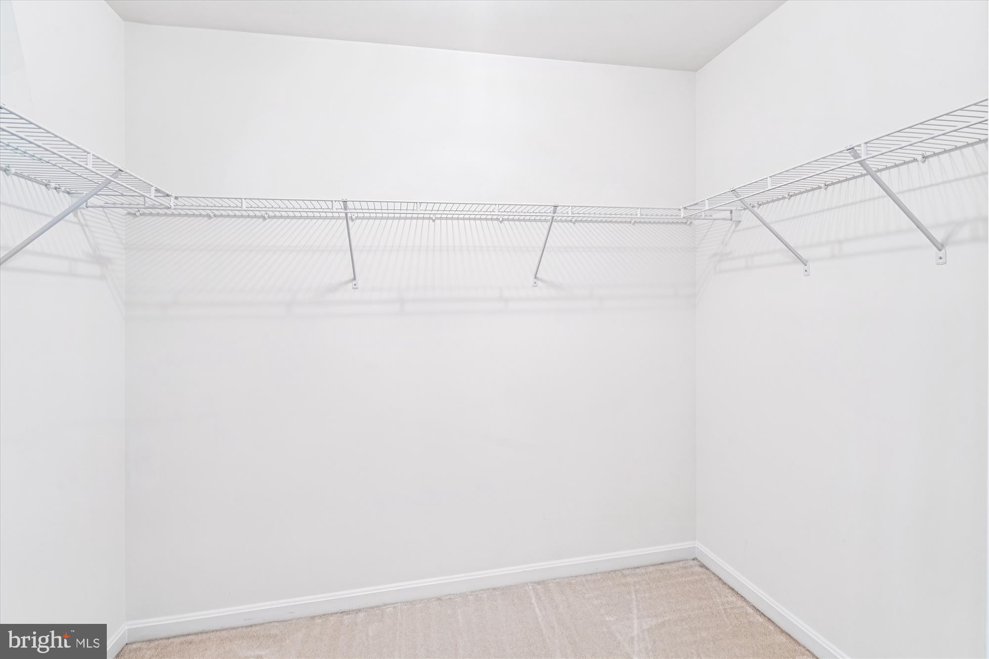 206 Heatherbloom Trail Gambrills, MD 21054 - Photo 25 of 46 a view of a room with racks on the wall