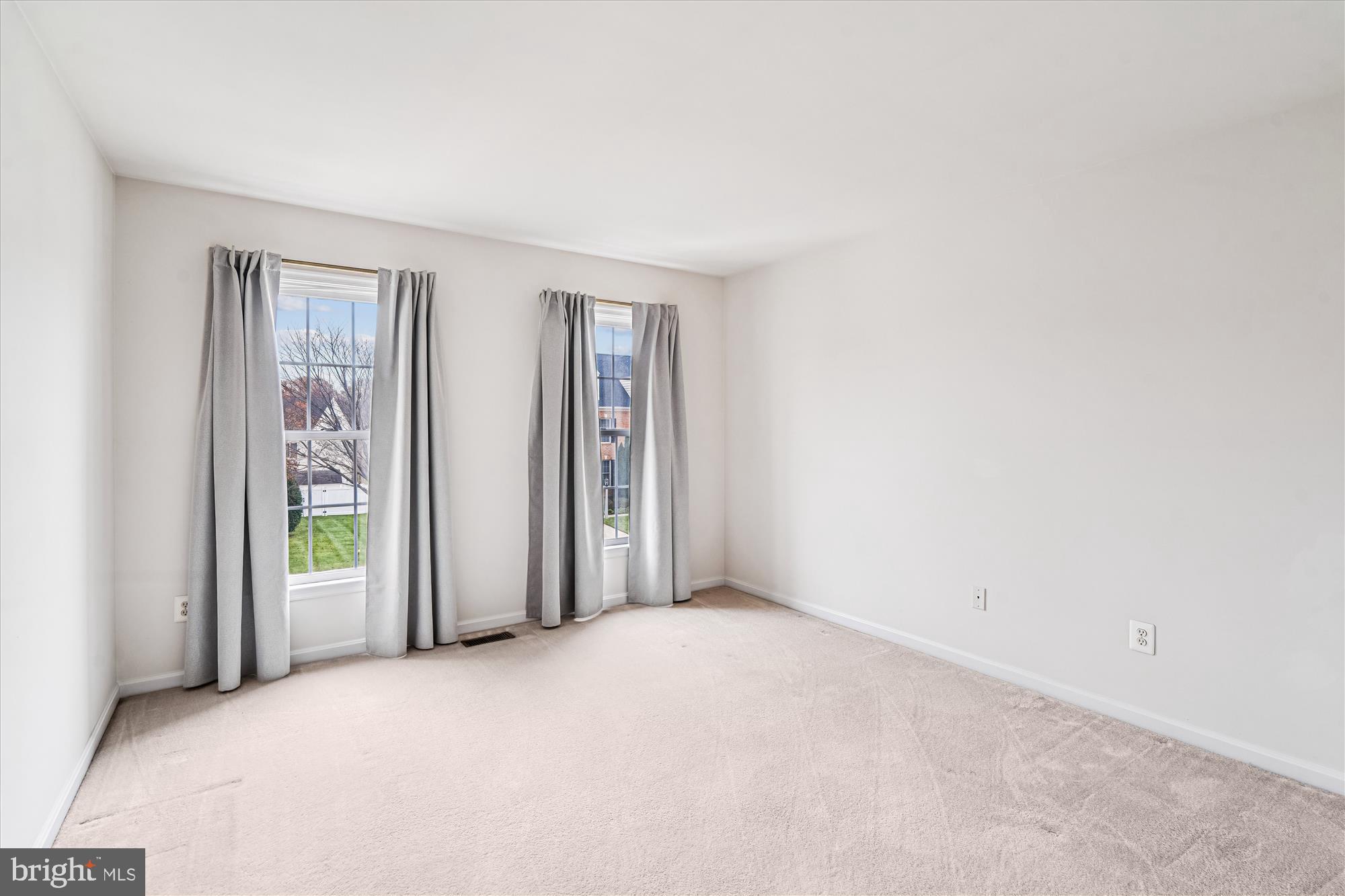 206 Heatherbloom Trail Gambrills, MD 21054 - Photo 28 of 46 an empty room with windows