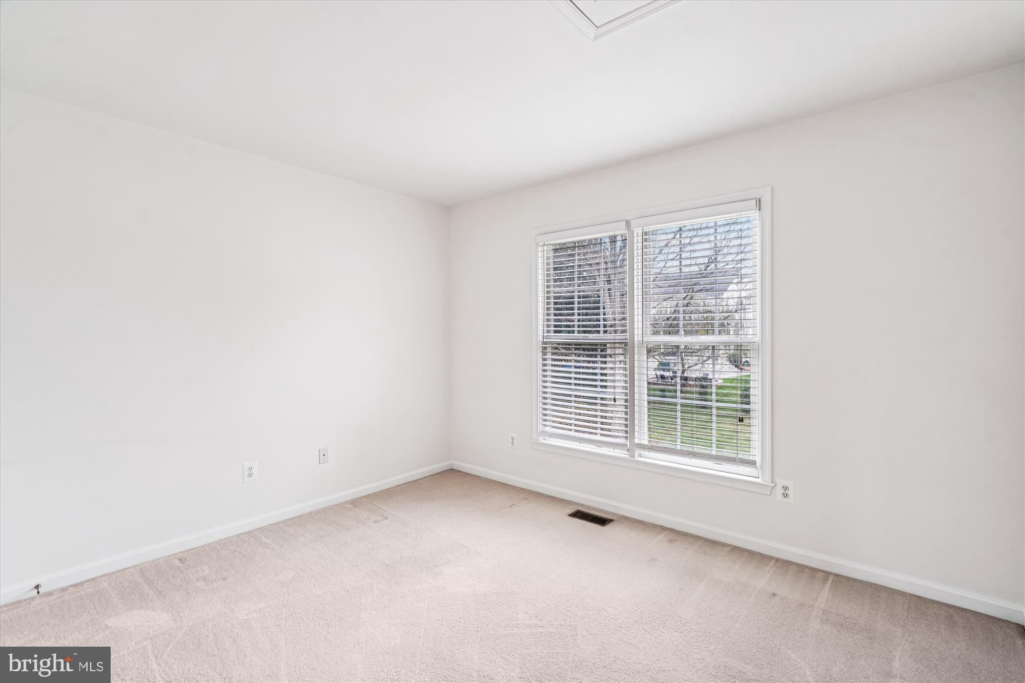 206 Heatherbloom Trail Gambrills, MD 21054 - Photo 30 of 46 an empty room with a window