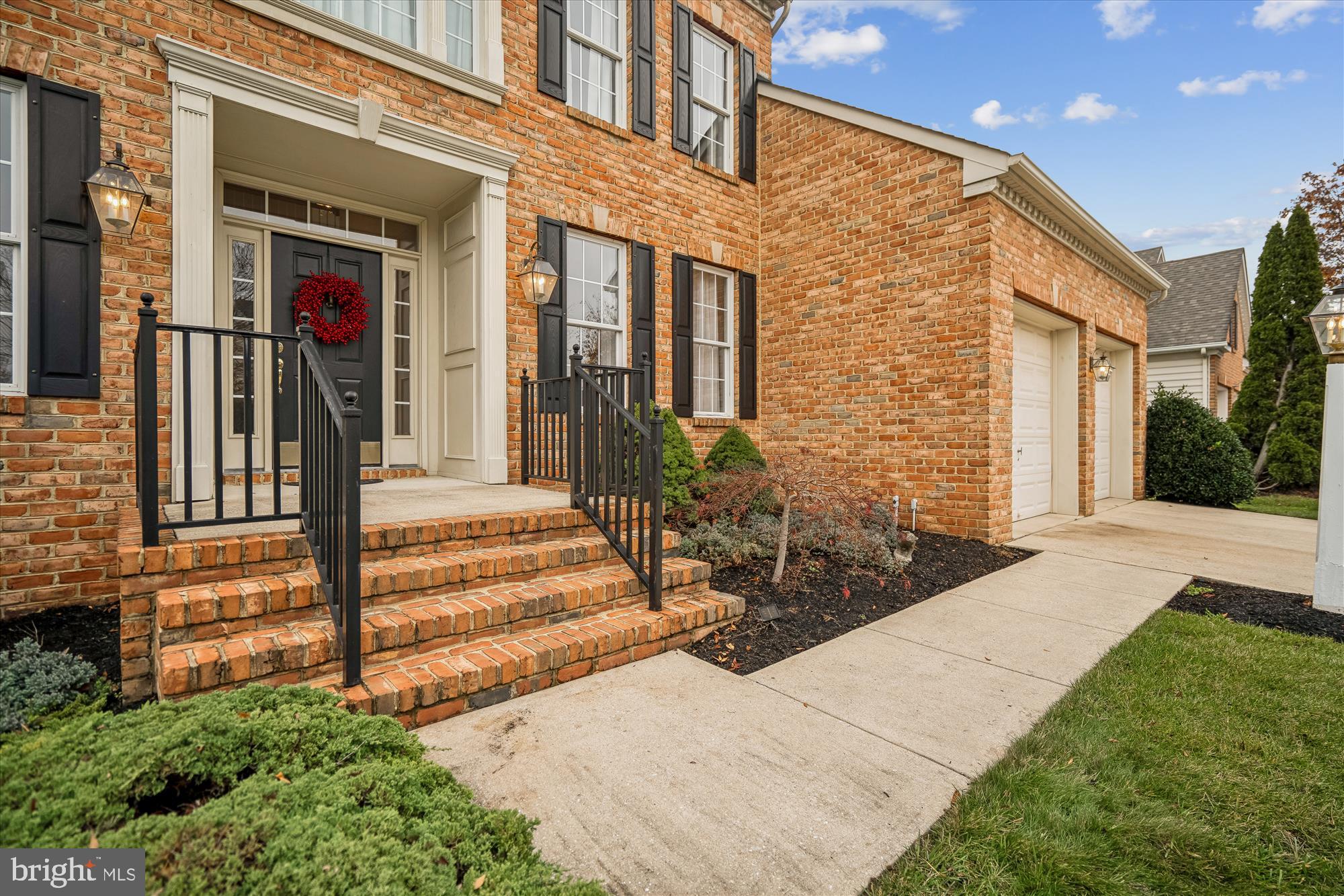206 Heatherbloom Trail Gambrills, MD 21054 - Photo 3 of 46 a view of a brick house with a large windows