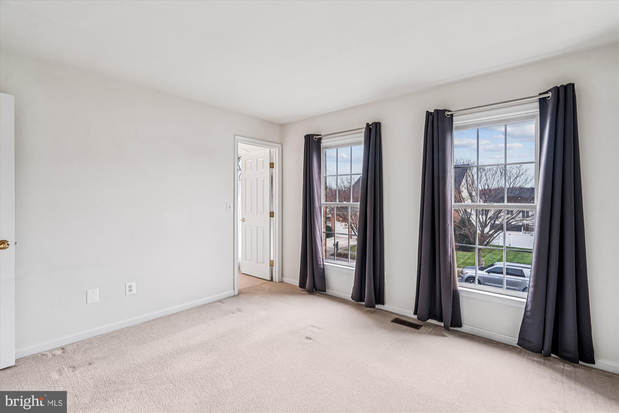 206 Heatherbloom Trail Gambrills, MD 21054 - Photo 32 of 46 an empty room with windows and closet