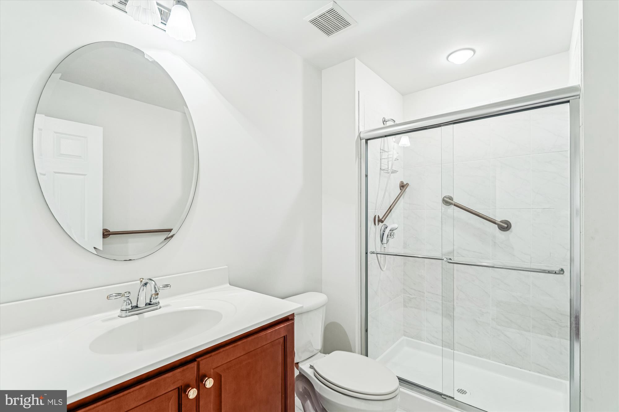 206 Heatherbloom Trail Gambrills, MD 21054 - Photo 39 of 46 a bathroom with a sink toilet and shower