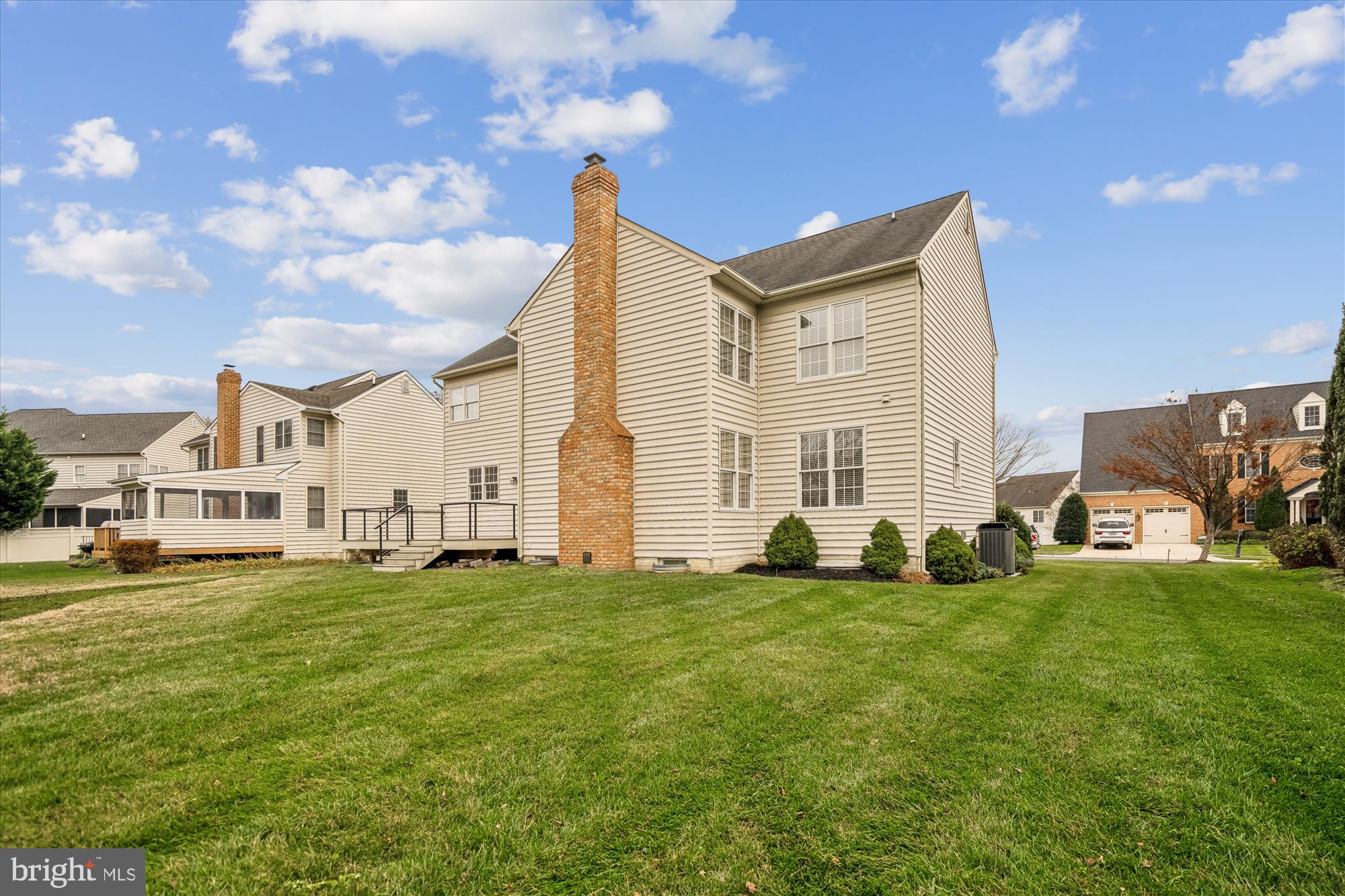 206 Heatherbloom Trail Gambrills, MD 21054 - Photo 4 of 46 a view of a house with a big yard and large trees