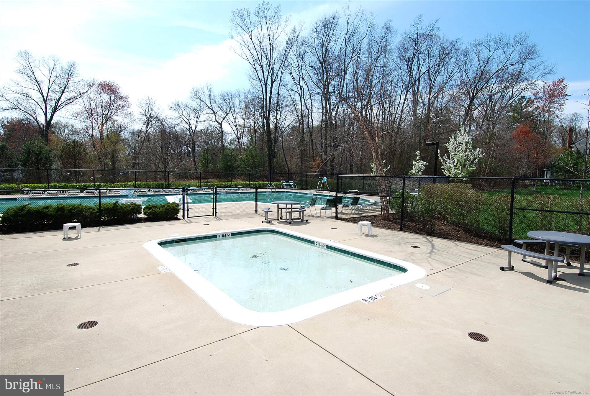 206 Heatherbloom Trail Gambrills, MD 21054 - Photo 43 of 46 a outdoor space with a table and chairs
