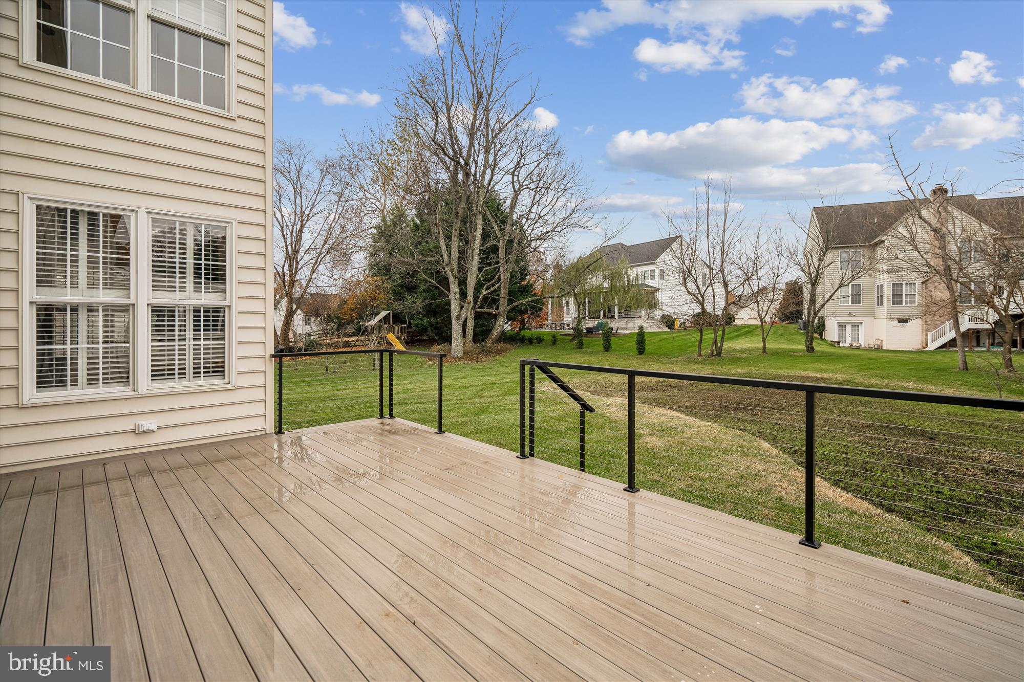 206 Heatherbloom Trail Gambrills, MD 21054 - Photo 7 of 46 a view of wooden deck with a yard