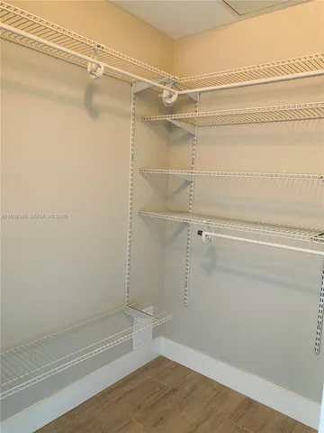 a view of a room with racks on the wall