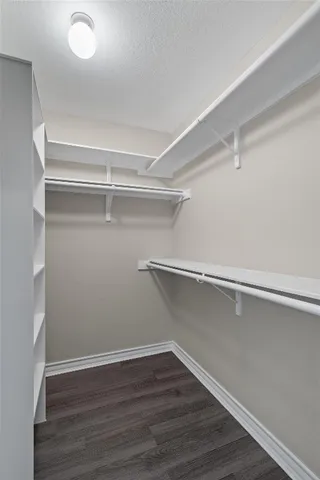 a view of an empty walk in closet